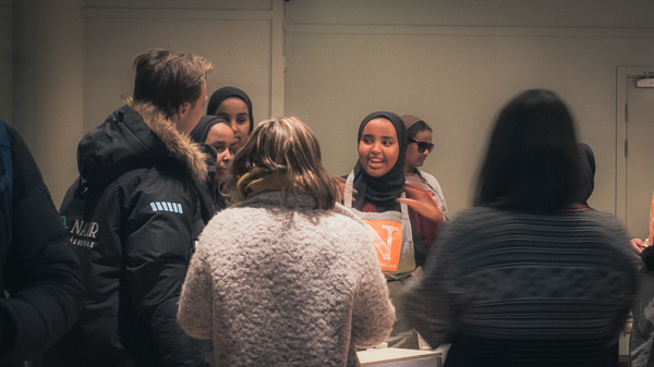 Youth employees selling growing kits at an event